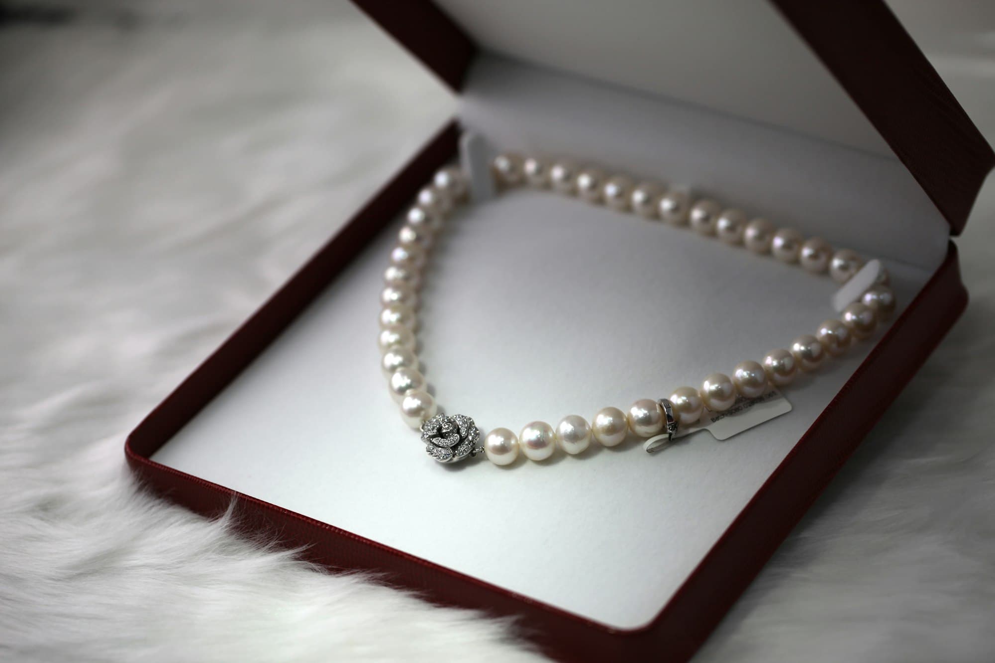 Diamond ring resting on soft linen